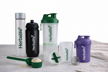 Herbalife accessories including shaker bottles and tools