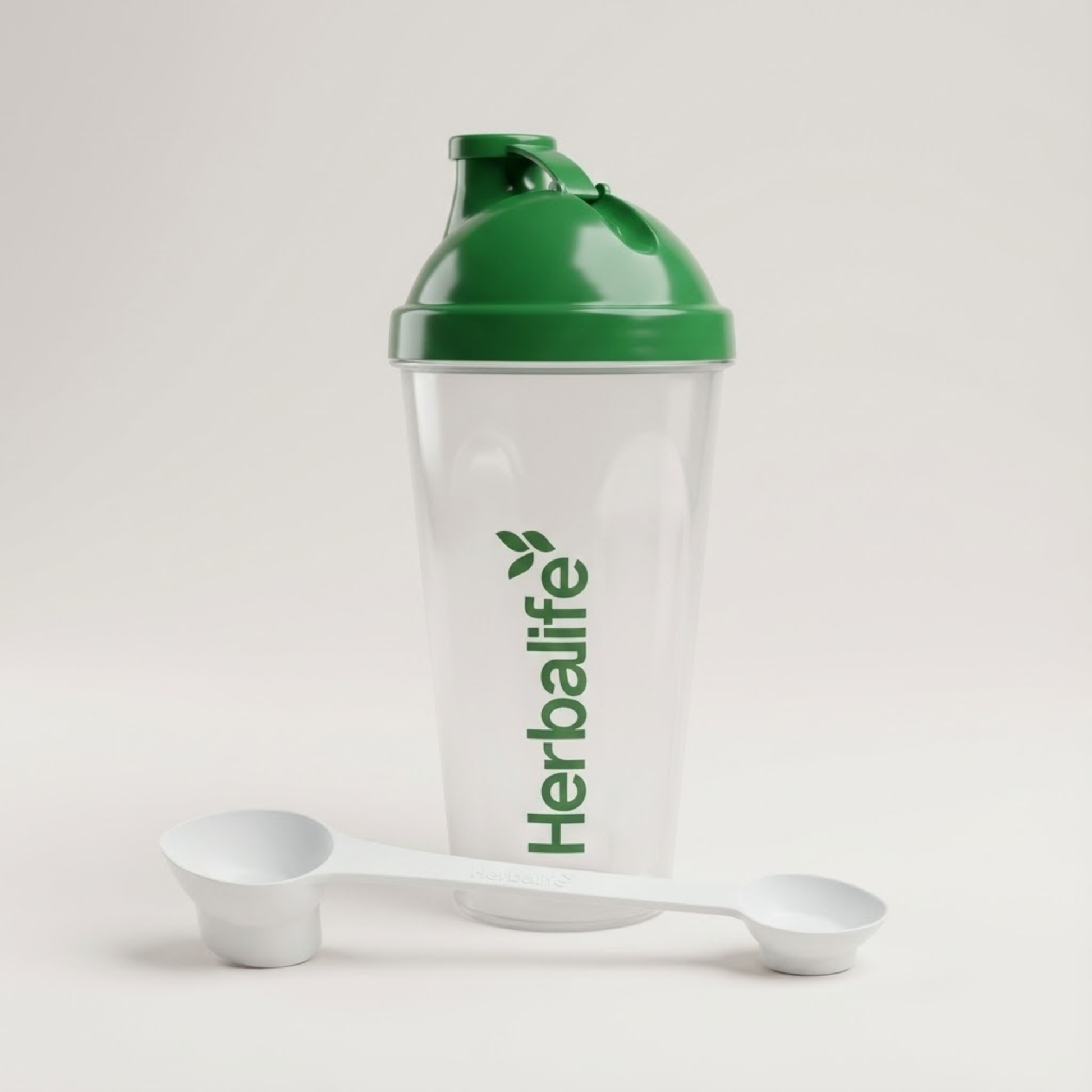 Herbalife shaker bottle with measuring spoon for mixing shakes